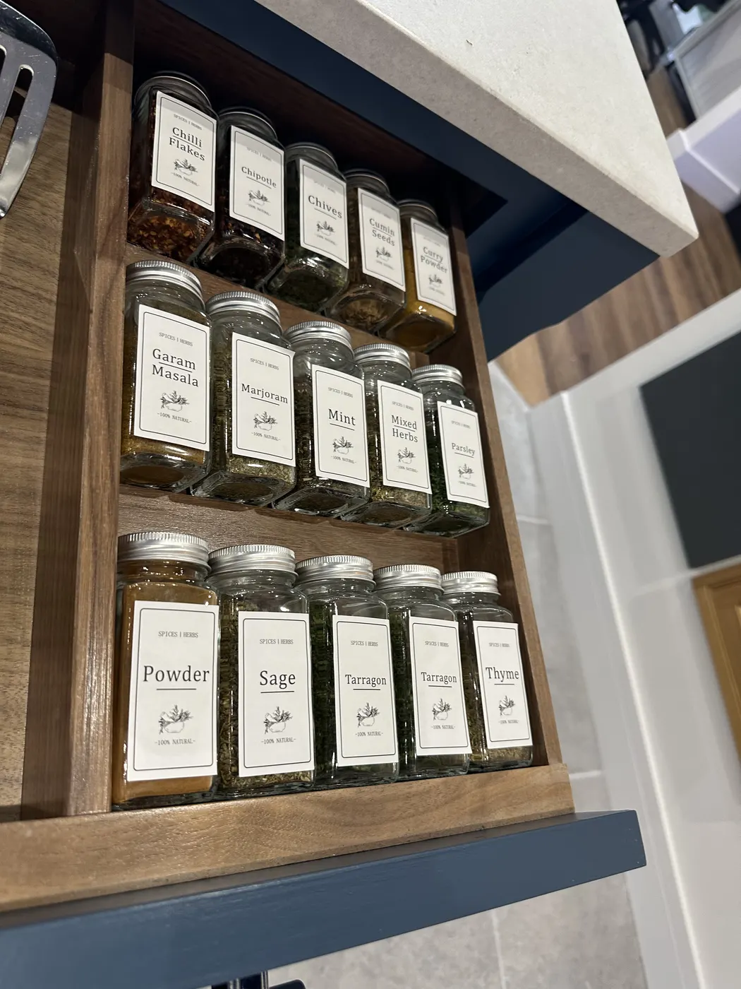 Spice drawer with matching labelled jars